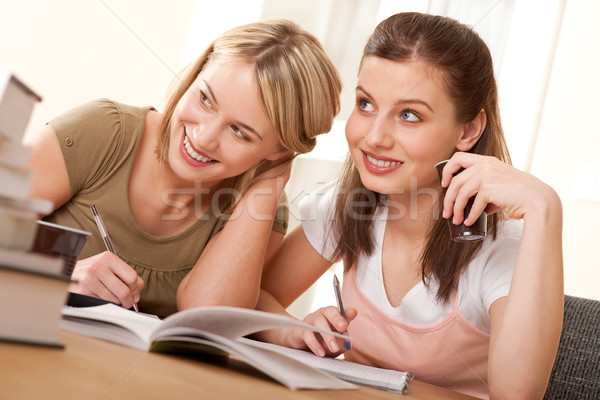 Stock photo: Student series - Two girls doing homework