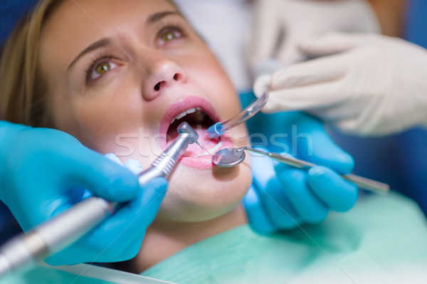 Scared patient at dentist office closeup mouth Stock photo © CandyboxPhoto