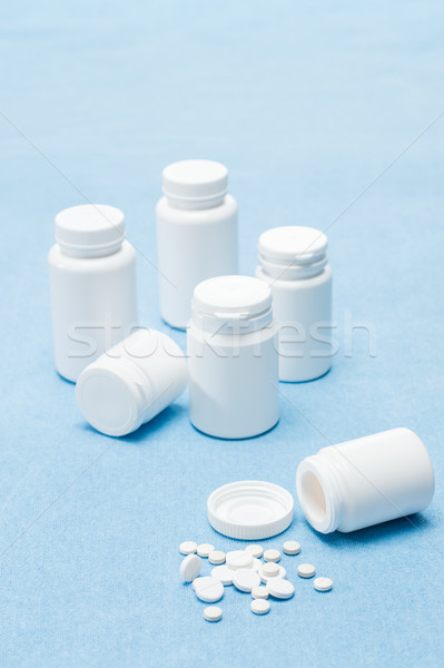 Medicament pills on medical blue background Stock photo © CandyboxPhoto