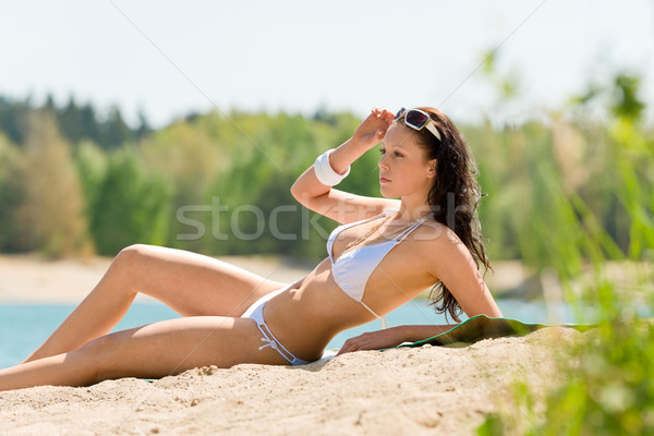 Nyár tengerpart lenyűgöző nő napozás bikini Stock fotó © CandyboxPhoto
