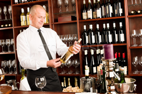 Stock photo: Wine bar waiter happy male in restaurant