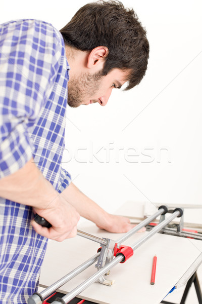 Home improvement - handyman cut tile Stock photo © CandyboxPhoto