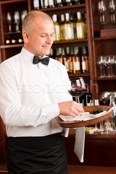 Wine bar waiter mature serve glass restaurant Stock photo © CandyboxPhoto