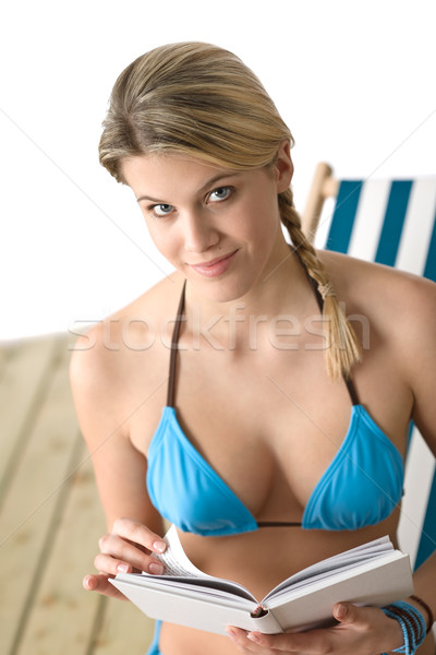 Beach - Happy young woman with book in bikini Stock photo © CandyboxPhoto