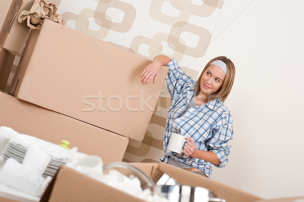 Moving house: Happy woman with box  Stock photo © CandyboxPhoto