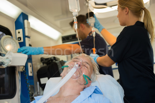 Bilinçsiz hasta oksijen maskesi ambulans kıdemli araba Stok fotoğraf © CandyboxPhoto