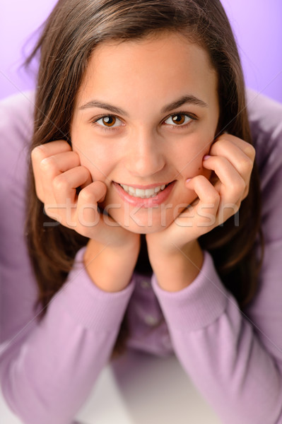 Teenage girl smiling on purple close-up portrait Stock photo © CandyboxPhoto