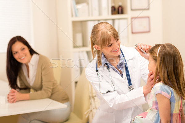 Pediatrician checking eye girl at medical office Stock photo © CandyboxPhoto