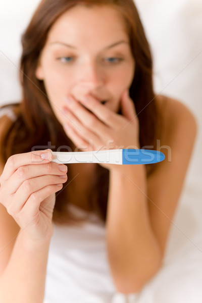 Pregnancy test - happy surprised woman Stock photo © CandyboxPhoto