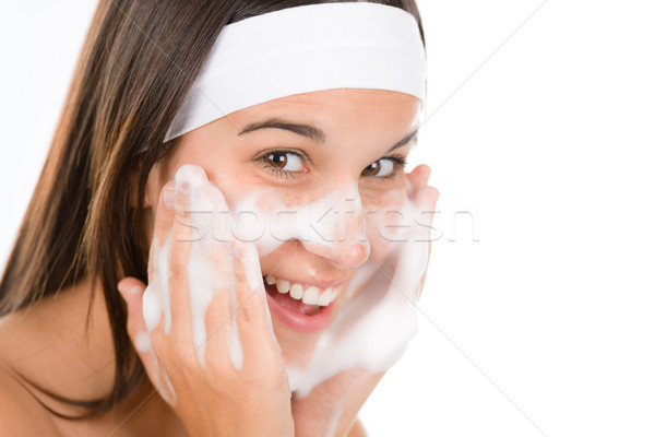 Teenager problem skin care - woman wash face Stock photo © CandyboxPhoto