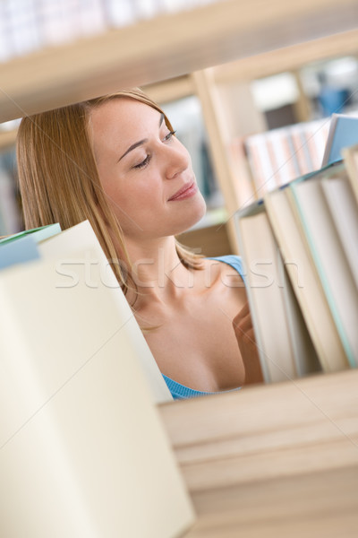 Diák könyvtár boldog nő tanulás könyv Stock fotó © CandyboxPhoto