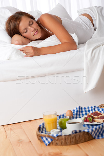 Stock photo: Young woman having home made breakfast