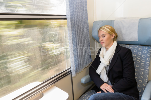 Woman asleep in train compartment tired resting Stock photo © CandyboxPhoto