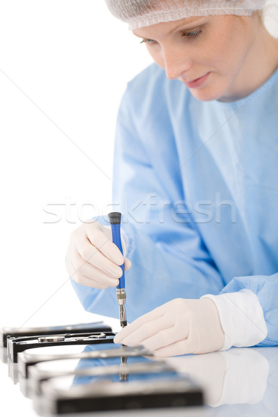 Female computer engineer repair hard disc defect, sterile Stock photo © CandyboxPhoto