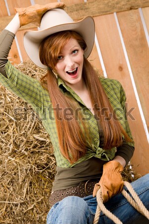 Provocative young cowgirl drink beer in barn Stock photo © CandyboxPhoto