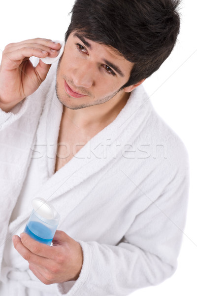 Gesichtspflege junger Mann Reinigung Gesicht Lotion weiß Stock foto © CandyboxPhoto