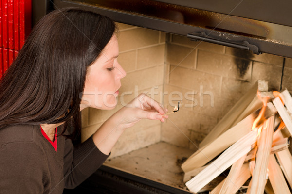 Home Fireplace Woman Lighting Up Wooden Logs Stock Photo C Jean