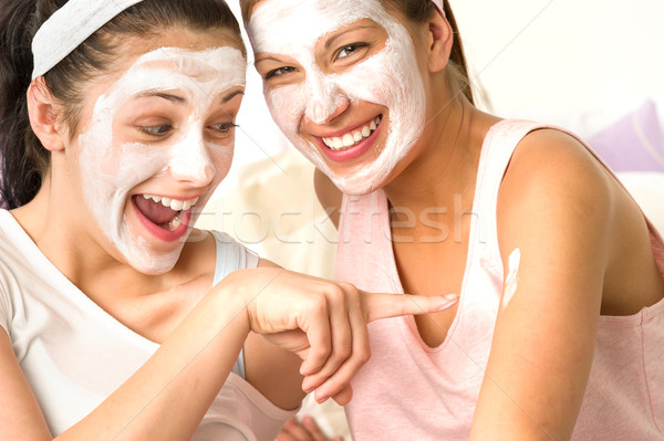 Caucasian girls wearing peeling mask having fun Stock photo © CandyboxPhoto
