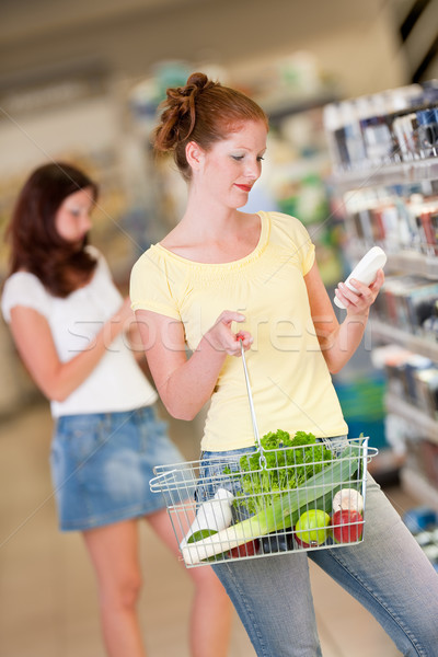 Shopping series - Red hair woman in cosmetics department Stock photo © CandyboxPhoto