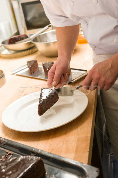 Chef placing slice of chocolate cake  Stock photo © CandyboxPhoto