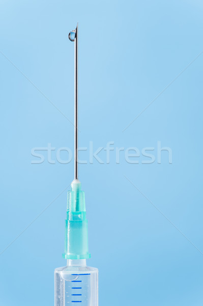 Medical syringe drop falling from needle Stock photo © CandyboxPhoto