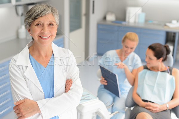 Stockfoto: Professionele · tandarts · chirurg · tandheelkundige · kliniek · patiënt