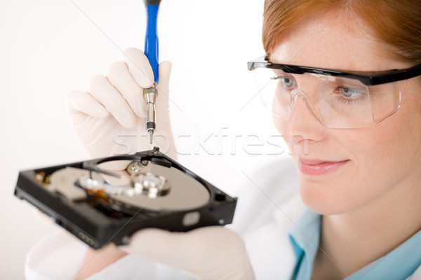 Female computer engineer - woman repair hard disc Stock photo © CandyboxPhoto
