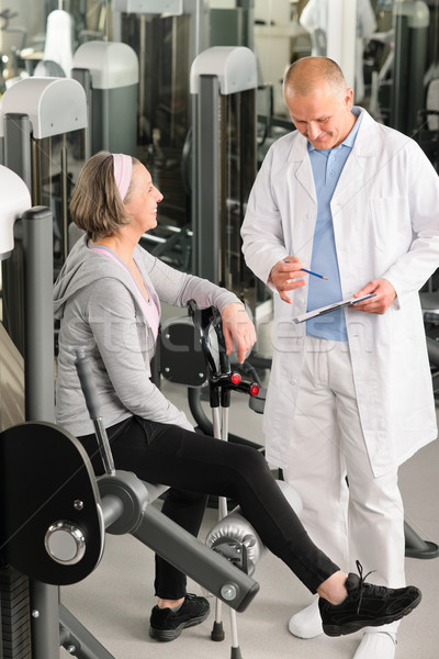 Physiotherapist assist active senior woman at gym Stock photo © CandyboxPhoto