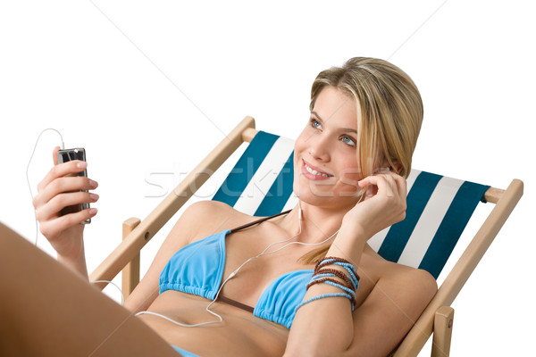 Stock photo: Beach - Happy woman in bikini relax with music