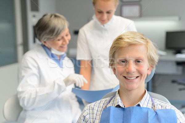 Teenage patient, dentist woman with dental assistant Stock photo © CandyboxPhoto