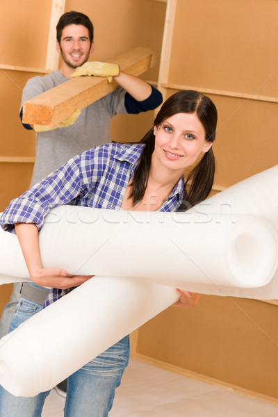 Stock photo: Home improvement young couple work on renovations