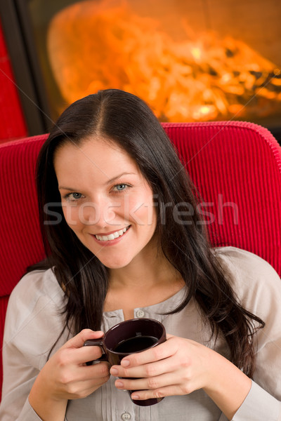 Winter home fireplace woman drink hot tea Stock photo © CandyboxPhoto