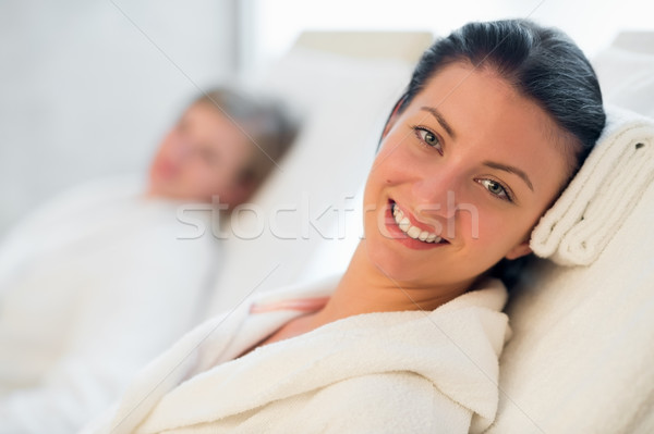Smiling woman resting at beauty spa room Stock photo © CandyboxPhoto