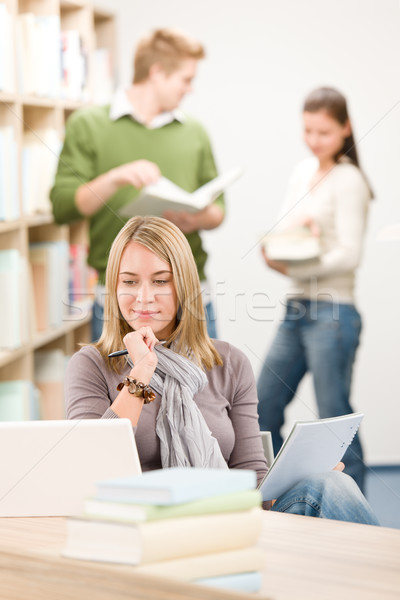 High school library - thoughtful student with laptop  Stock photo © CandyboxPhoto