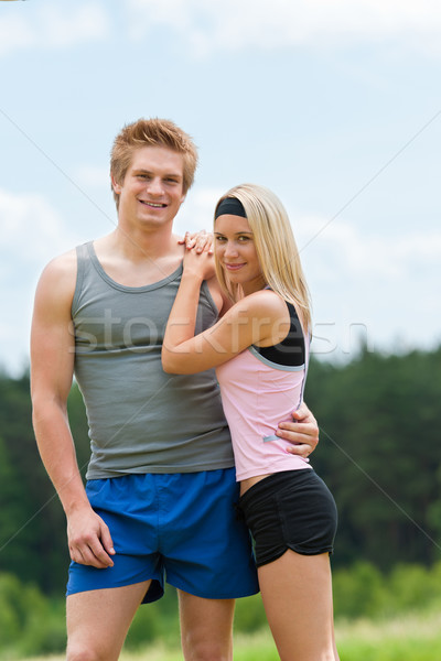 Sportive young couple happy posing in coutryside Stock photo © CandyboxPhoto