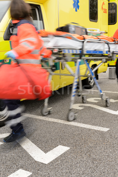Blurry hurrying paramedics running with gurney Stock photo © CandyboxPhoto