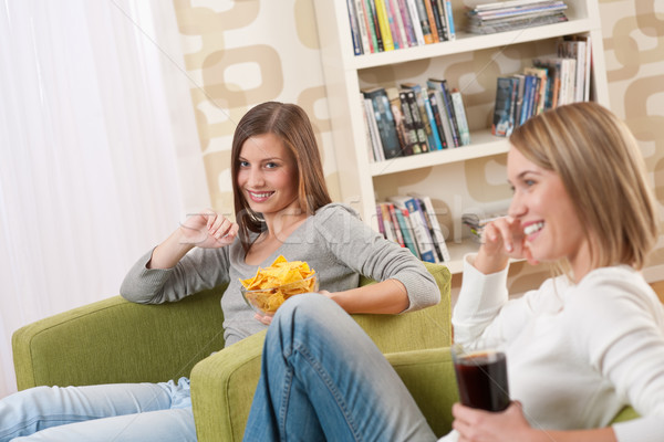Students - Two female teenager watching television Stock photo © CandyboxPhoto