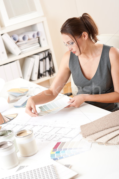 Female interior designer working with color swatch Stock photo © CandyboxPhoto