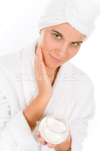 Teenager skin care - woman apply moisturizer Stock photo © CandyboxPhoto