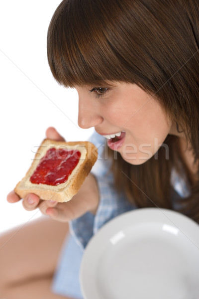 Foto stock: Feliz · adolescente · pijama · alimentación · saludable · brindis · desayuno