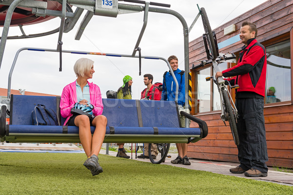 Happy couple sitting chair lift with bicycle Stock photo © CandyboxPhoto