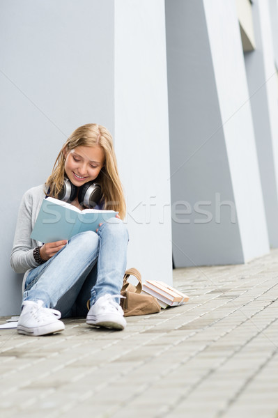 Smiling young study woman read book outdoor Stock photo © CandyboxPhoto