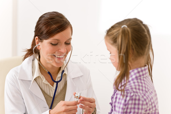 Female doctor examining child with stethoscope  Stock photo © CandyboxPhoto