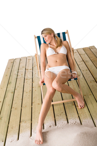 Plaj kadın bikini güneşlenme güverte sandalye Stok fotoğraf © CandyboxPhoto