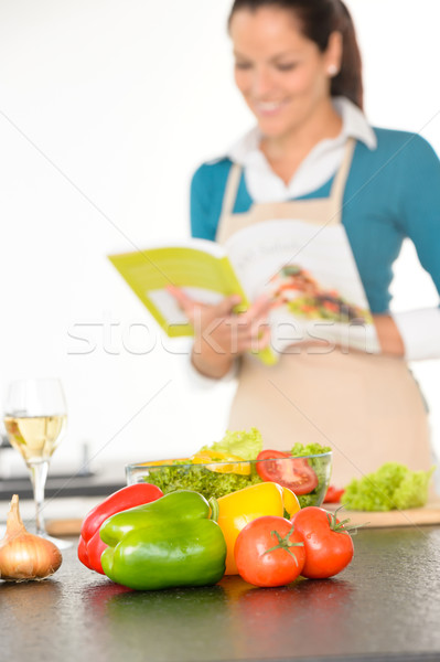 Happy woman preparing recipe vegetables cooking kitchen Stock photo © CandyboxPhoto