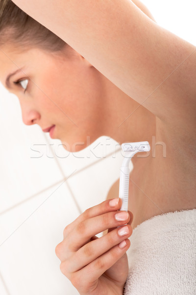 Body care series -Young woman shaving her armpit  Stock photo © CandyboxPhoto