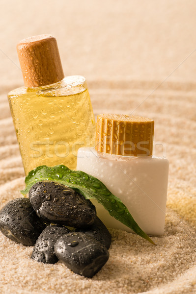 Spa therapy cosmetic products with zen stones Stock photo © CandyboxPhoto