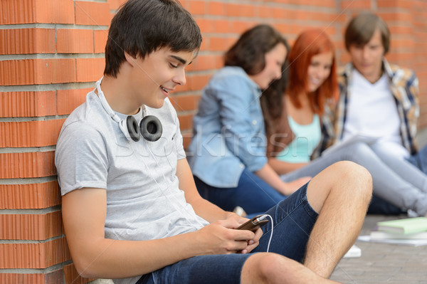 Young student man hanging out with friends Stock photo © CandyboxPhoto