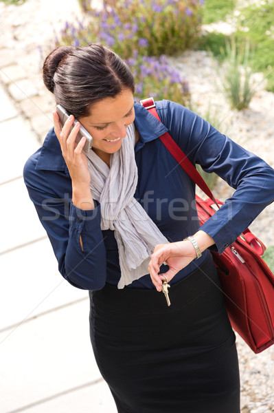 Woman calling rushing arriving home business phone Stock photo © CandyboxPhoto