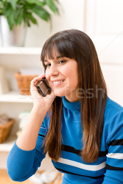 Stock photo: Teenager girl relax home - on phone